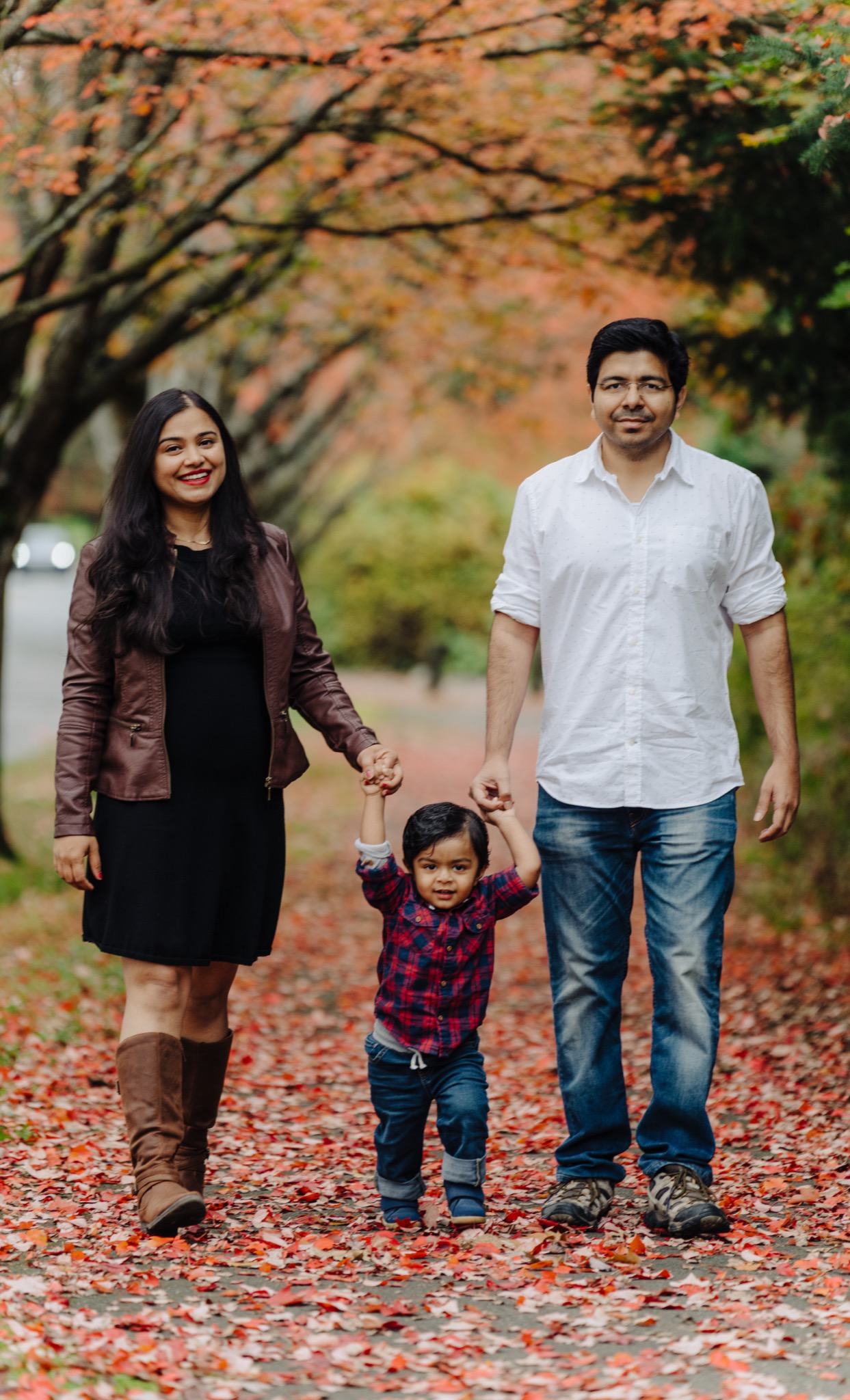 Children playing in autumn leaves during Bothell WA fall mini session