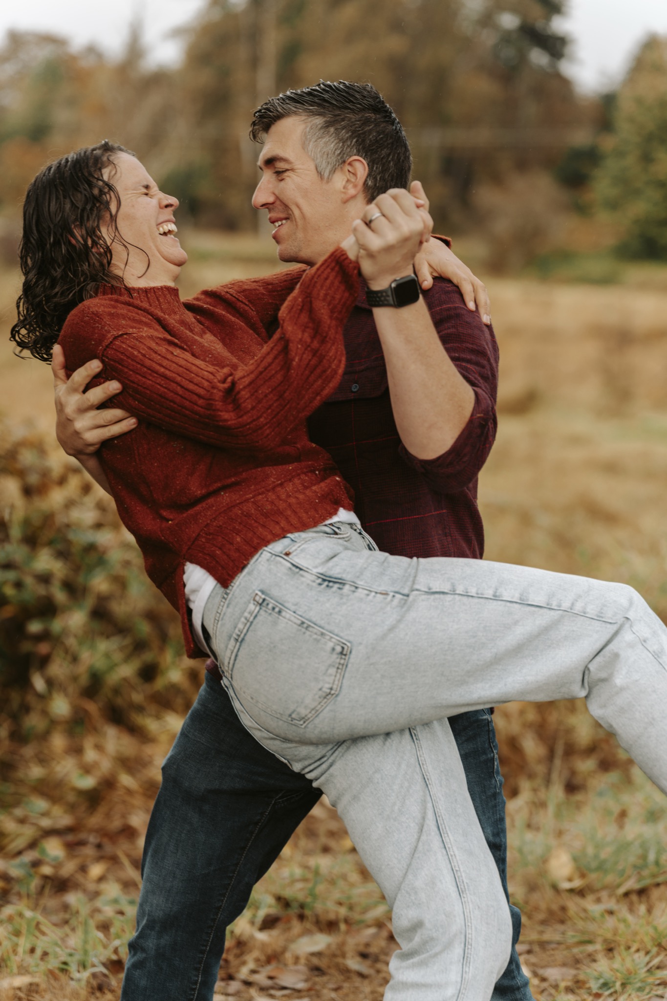 Family among apple trees during fall mini session in Snohomish County WA