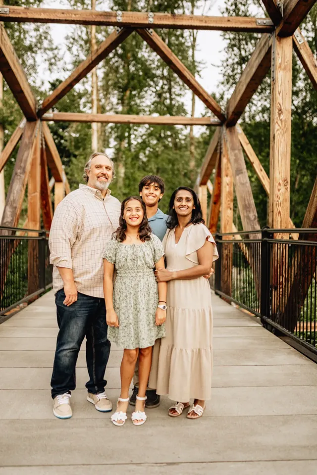 Stylishly dressed family in coordinated outfits