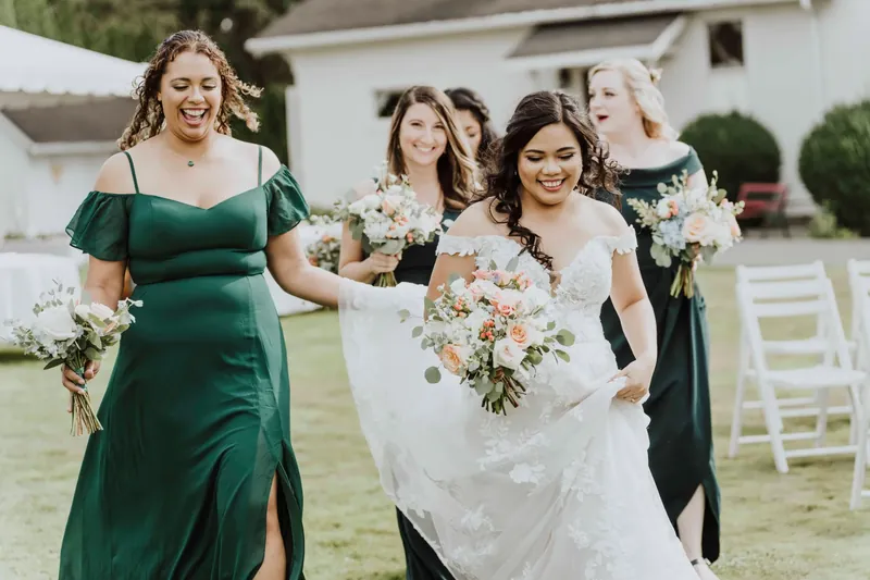 Wedding party gathered together outdoors