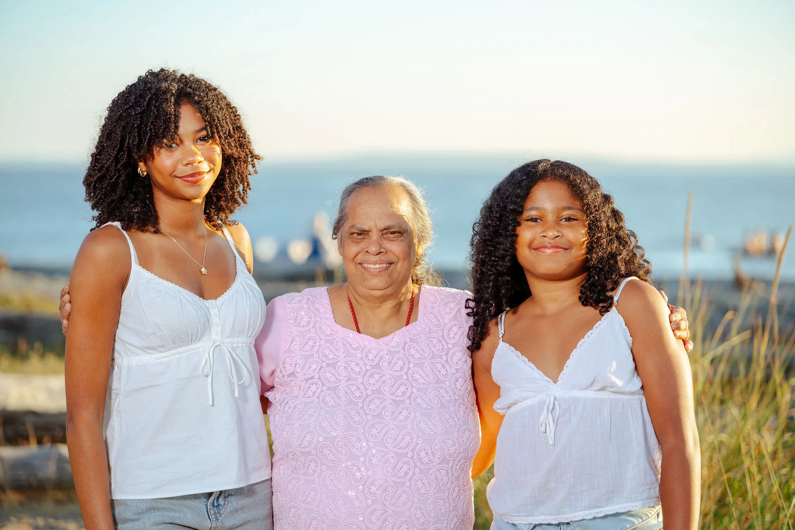 Three generations together on the shoreline
