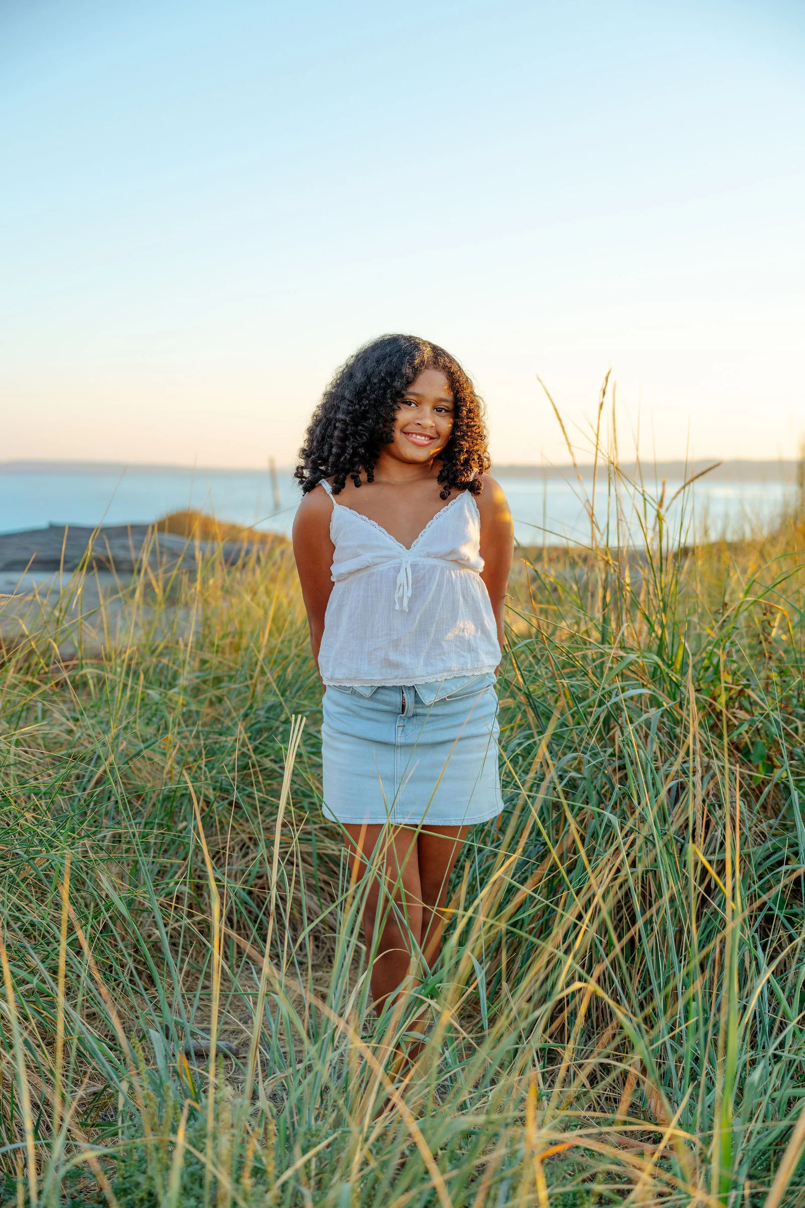 Portrait in the dune grass at golden hour