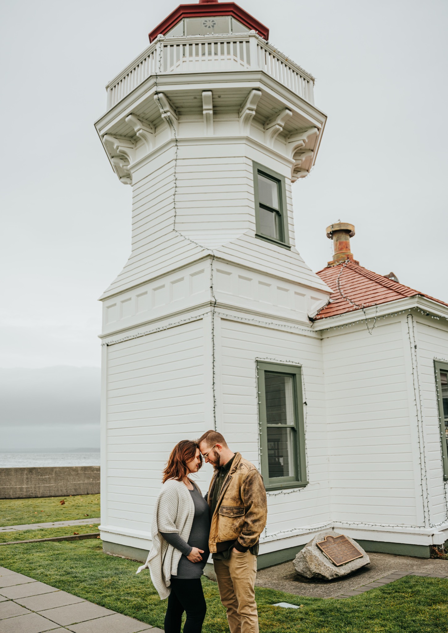 Couple at waterfront pier near Edmonds fishing pier at sunset