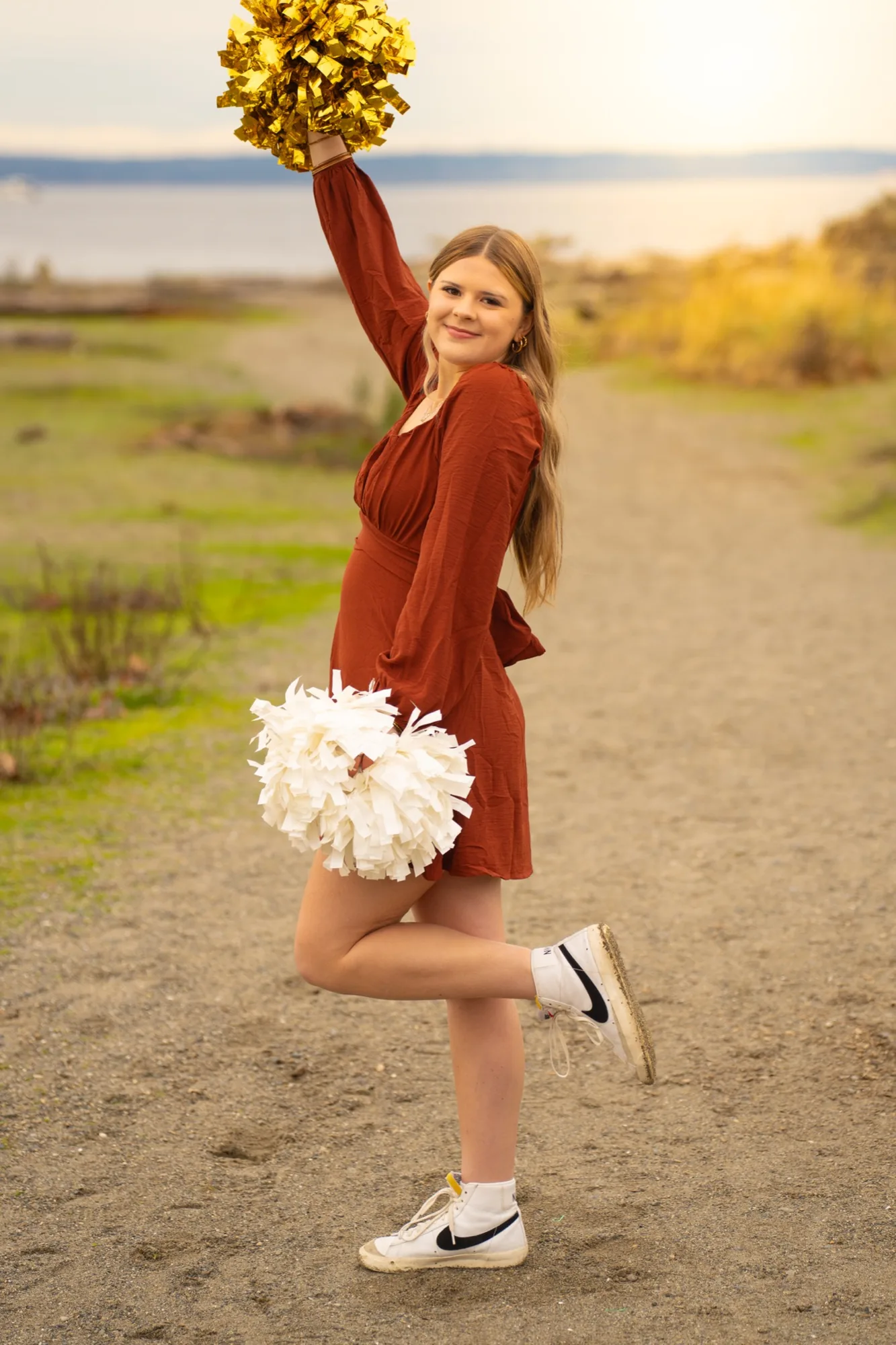 Senior portrait session in golden field in Snohomish County