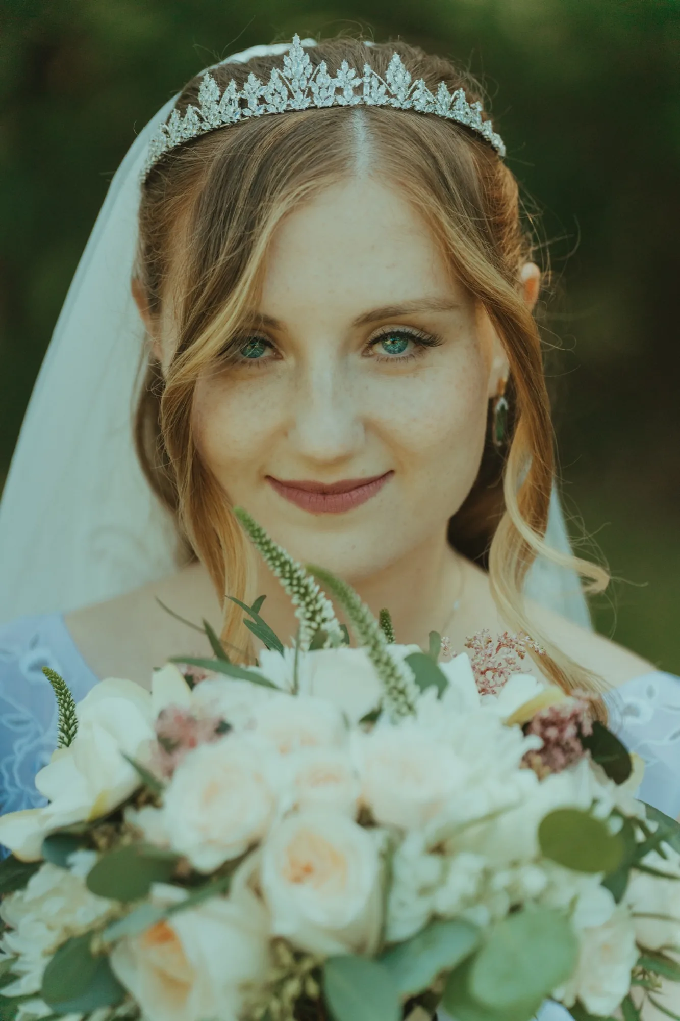 Bride close-up portrait with bridal bouquet at Snohomish County wedding