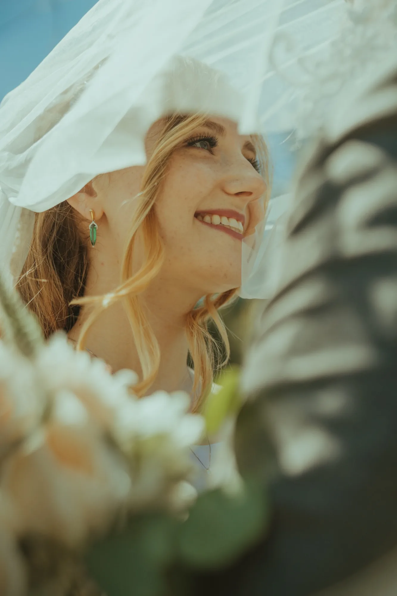 Bride with veil smiling during portrait session at Snohomish County wedding