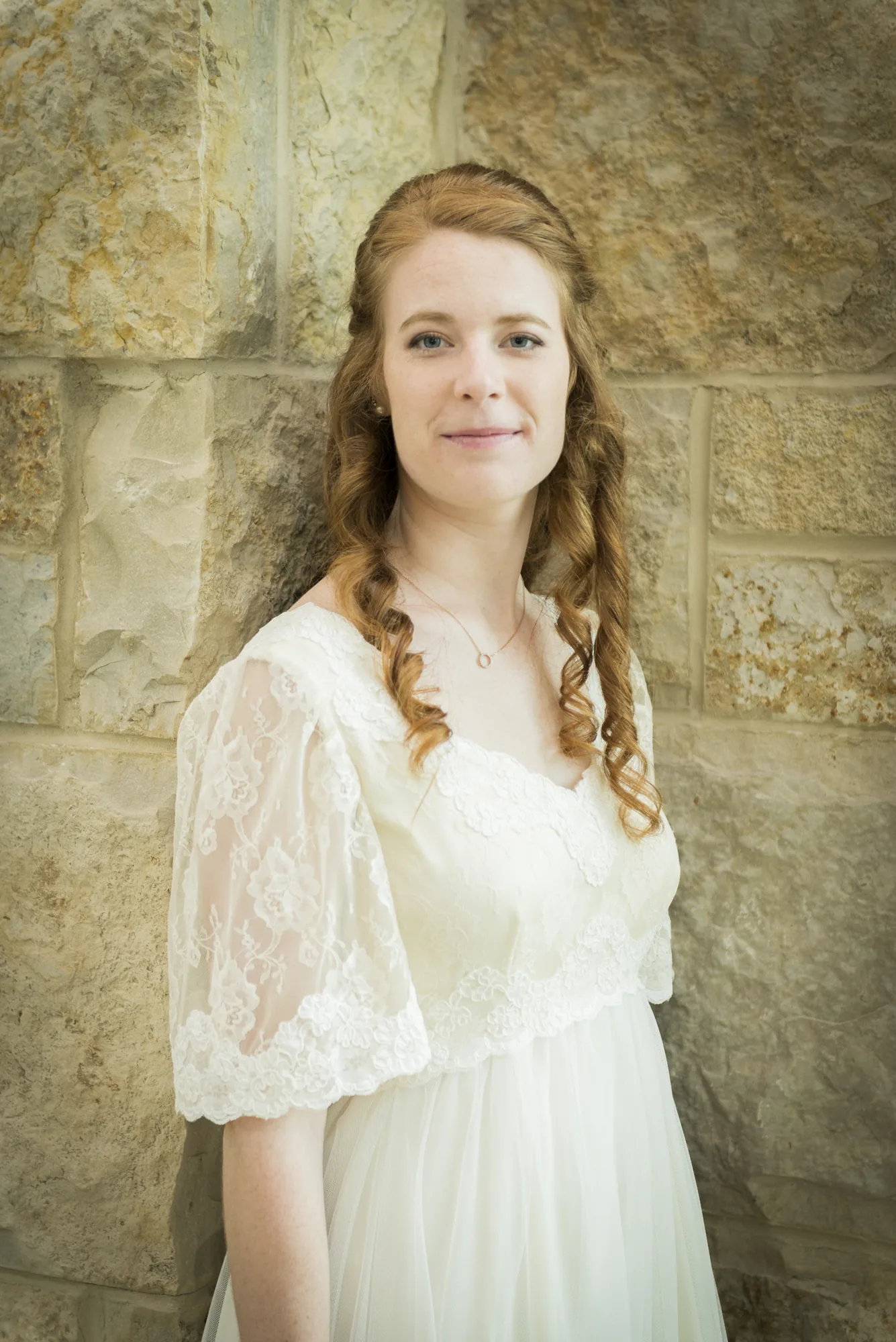 Bride portrait at stone wall venue during Snohomish County wedding