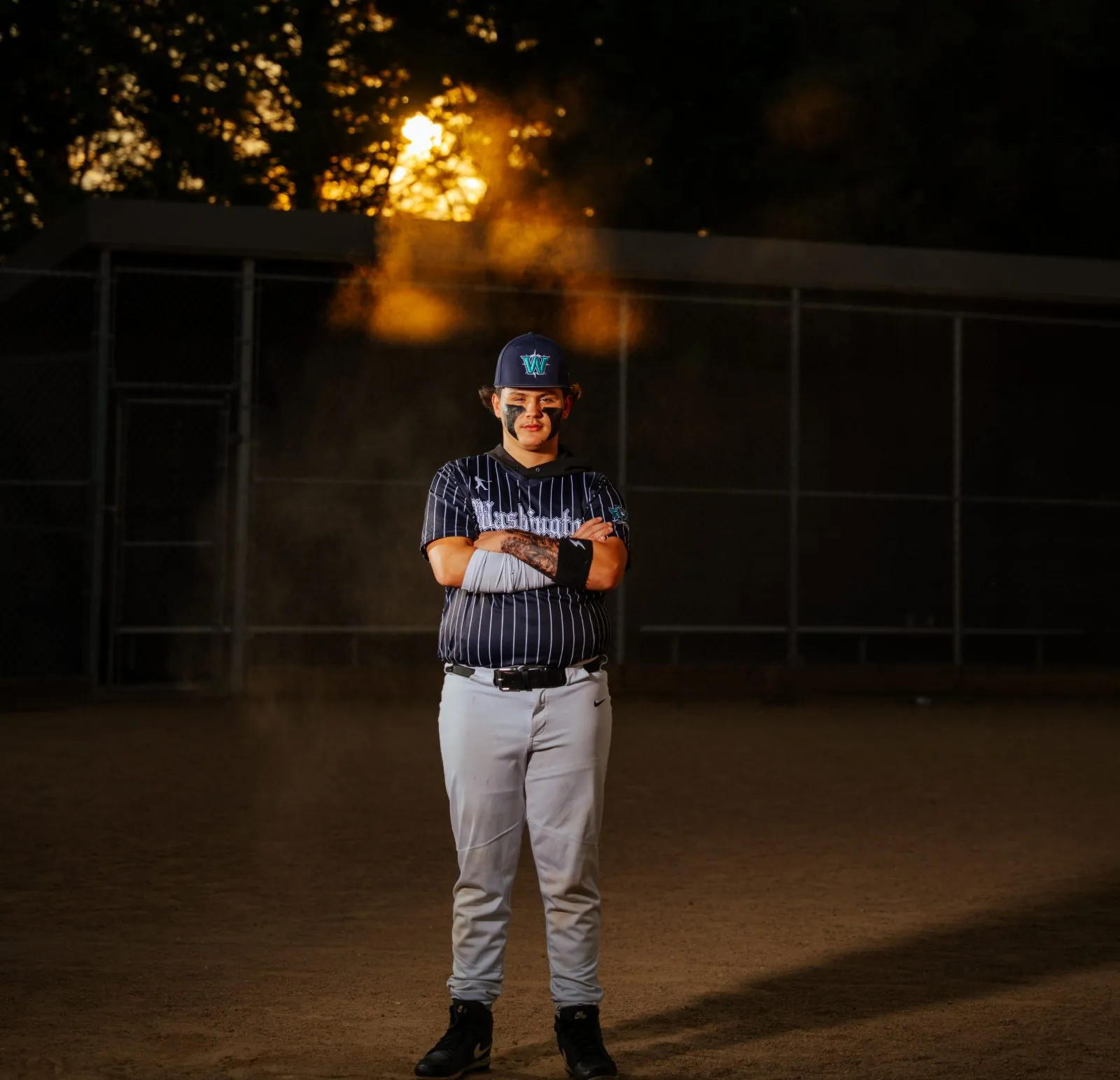 Athlete in the dugout during game-day coverage