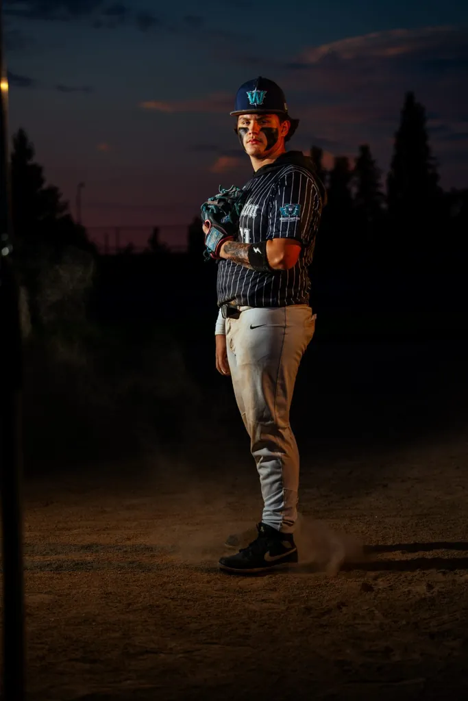 Athlete portrait, low-key dramatic lighting — SunnyT Productions