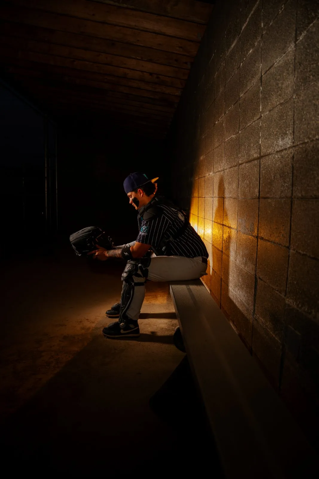 Team-color uniform photographed under stadium lights