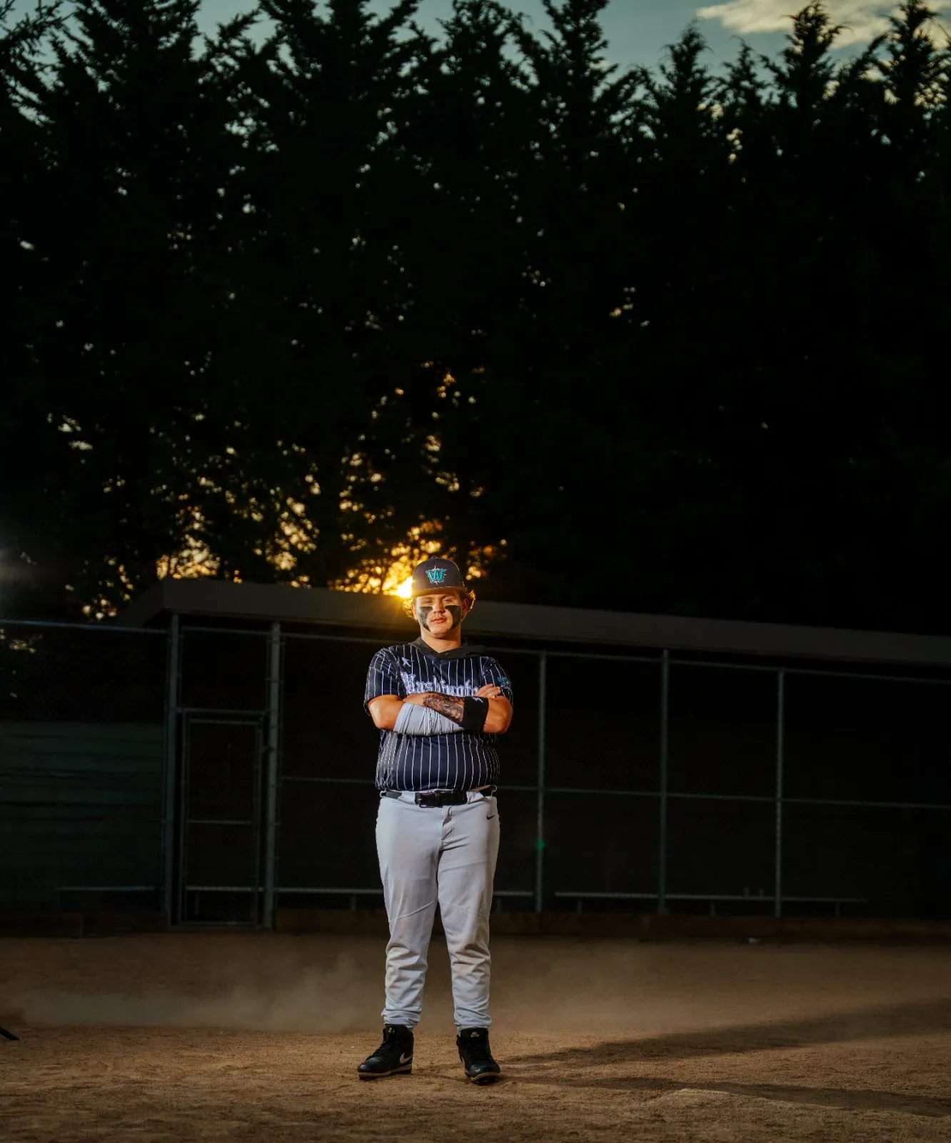 Senior athlete field portrait in evening light